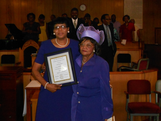 Glenda Terrell presents the GJM Lifetime Achievement Award to Lula Mae Dixon